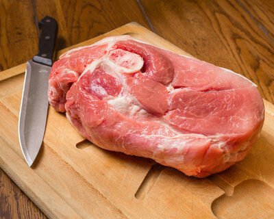 pork boston butt roast bone in on cutting board