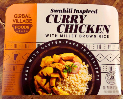 curry chicken on a bed of rice and millet