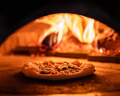 pizza and a wood fired oven