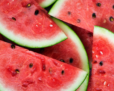 sliced juicy red vermont grown watermelon with seeds