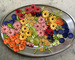 a platter of beautiful upcycled leather flowers