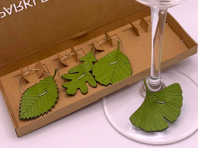 green upcycled leather win glass charms leaves