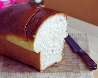 fresh brioche on a cutting board