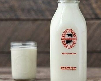 new york state heavy cream in a glass bottle