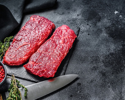ranch steaks on a cutting board
